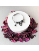 Pulsera  - Acero hipoalergenico - Cordón Metálico Plateado con adornos - Corazón negro con lazo negro